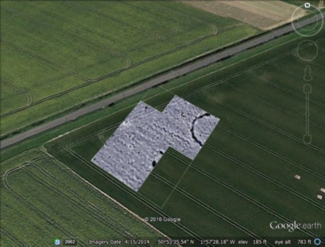 Geophysics plot of the ... overlain onto Google earth. The terminals of the flanking long barrow ditches can be seen to the left of the ring ditch.